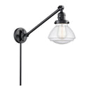 Olean Swing Arm shown in the Matte Black finish with a Seedy shade