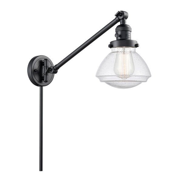 Olean Swing Arm shown in the Matte Black finish with a Seedy shade