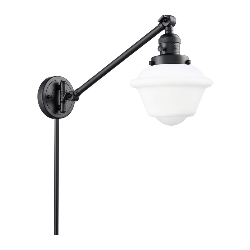 Oxford Swing Arm shown in the Matte Black finish with a Matte White shade