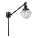 Oxford Swing Arm shown in the Matte Black finish with a Clear shade