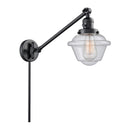 Oxford Swing Arm shown in the Matte Black finish with a Seedy shade