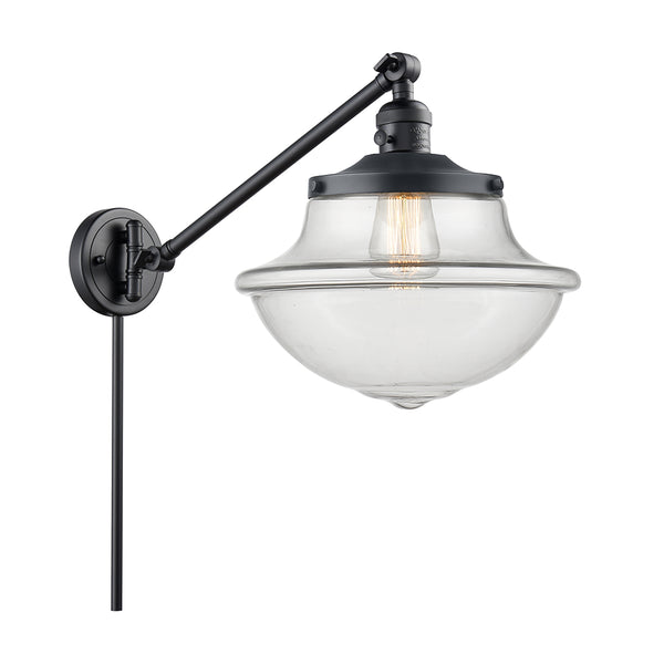 Oxford Swing Arm shown in the Matte Black finish with a Clear shade