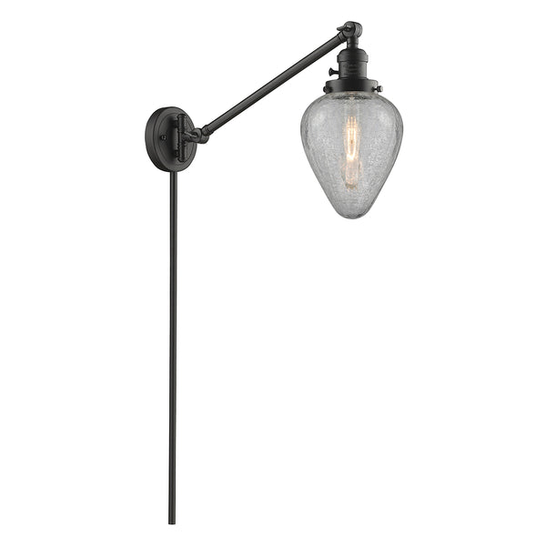 Geneseo Swing Arm shown in the Oil Rubbed Bronze finish with a Clear Crackled shade