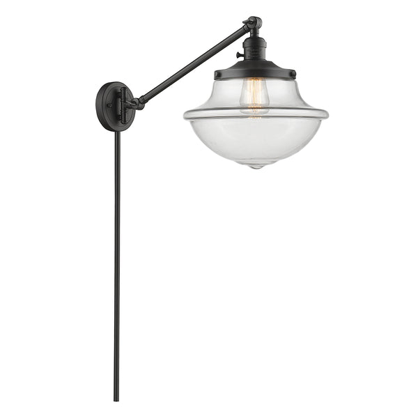 Oxford Swing Arm shown in the Oil Rubbed Bronze finish with a Clear shade