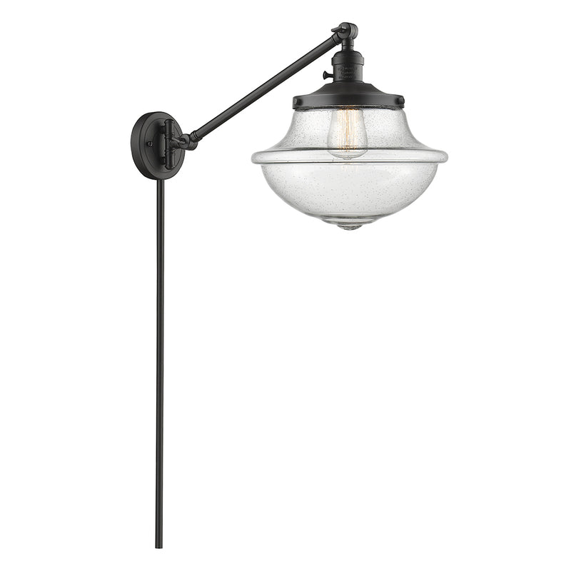 Oxford Swing Arm shown in the Oil Rubbed Bronze finish with a Seedy shade