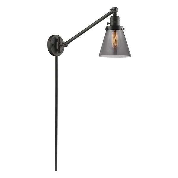 Cone Swing Arm shown in the Oil Rubbed Bronze finish with a Plated Smoke shade