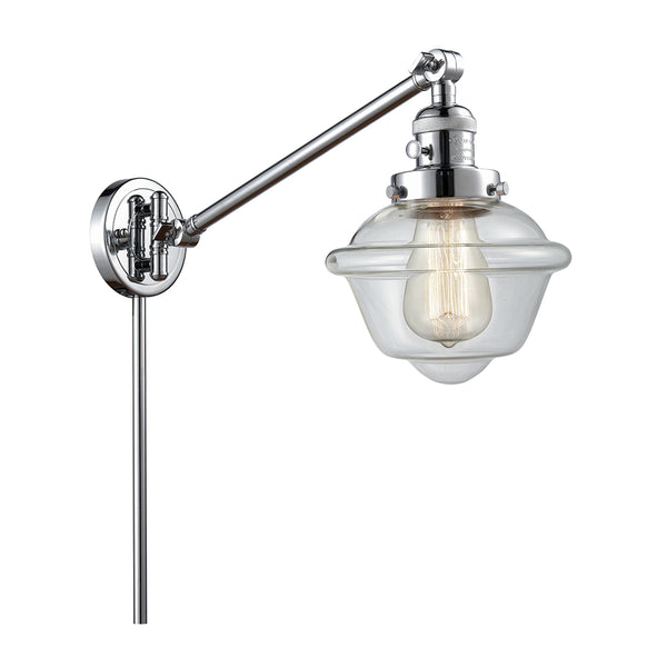 Oxford Swing Arm shown in the Polished Chrome finish with a Clear shade