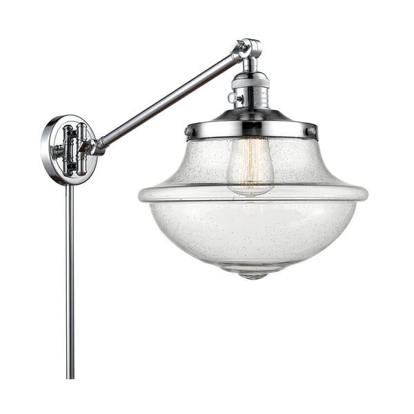 Oxford Swing Arm shown in the Polished Chrome finish with a Seedy shade