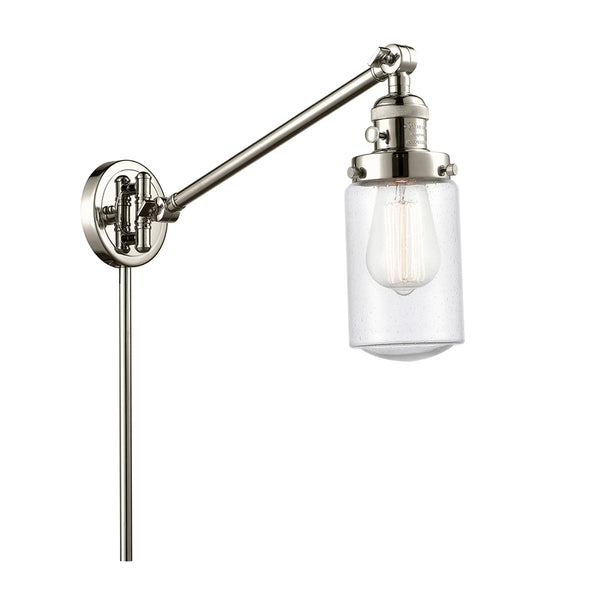 Dover Swing Arm shown in the Polished Nickel finish with a Seedy shade