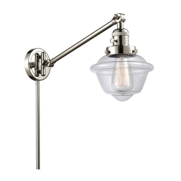 Oxford Swing Arm shown in the Polished Nickel finish with a Clear shade