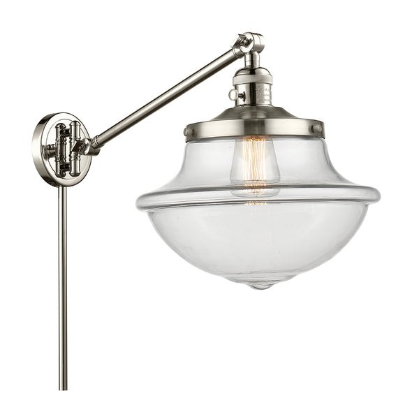Oxford Swing Arm shown in the Polished Nickel finish with a Clear shade
