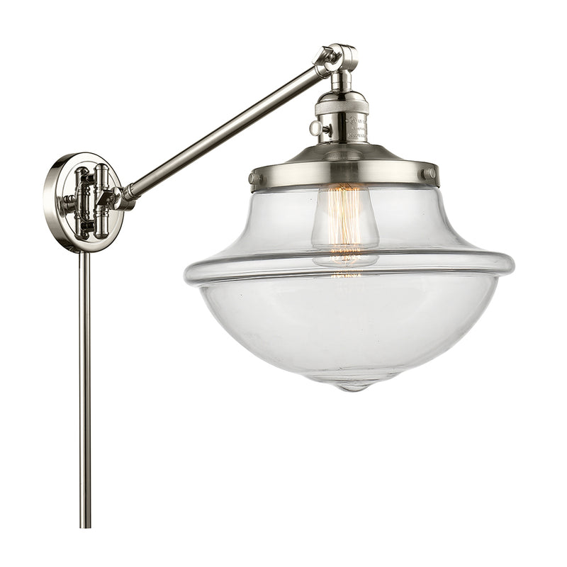 Oxford Swing Arm shown in the Polished Nickel finish with a Clear shade