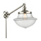 Oxford Swing Arm shown in the Polished Nickel finish with a Clear shade