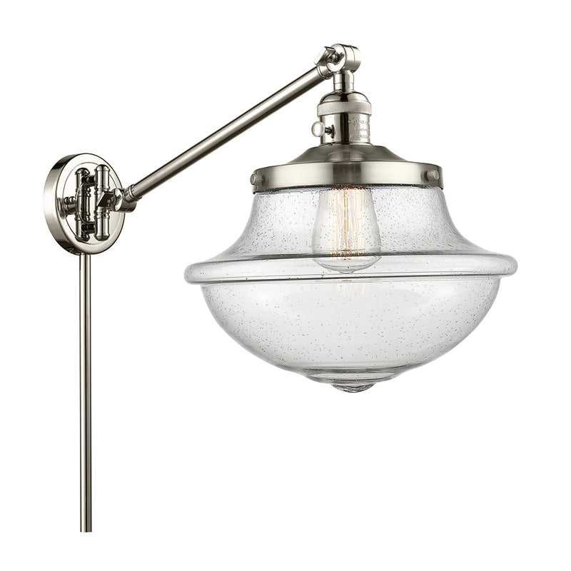 Oxford Swing Arm shown in the Polished Nickel finish with a Seedy shade