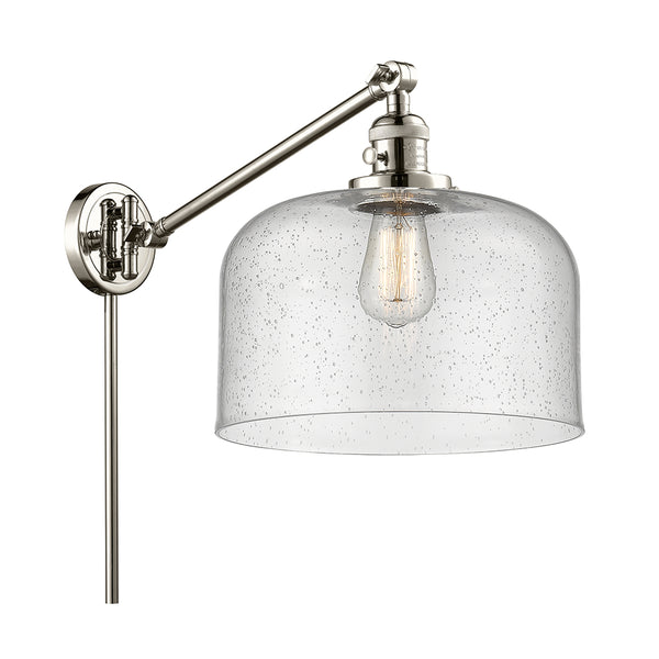 Bell Swing Arm shown in the Polished Nickel finish with a Seedy shade