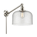 Bell Swing Arm shown in the Polished Nickel finish with a Seedy shade