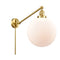 Beacon Swing Arm shown in the Satin Gold finish with a Matte White shade
