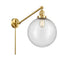 Beacon Swing Arm shown in the Satin Gold finish with a Seedy shade