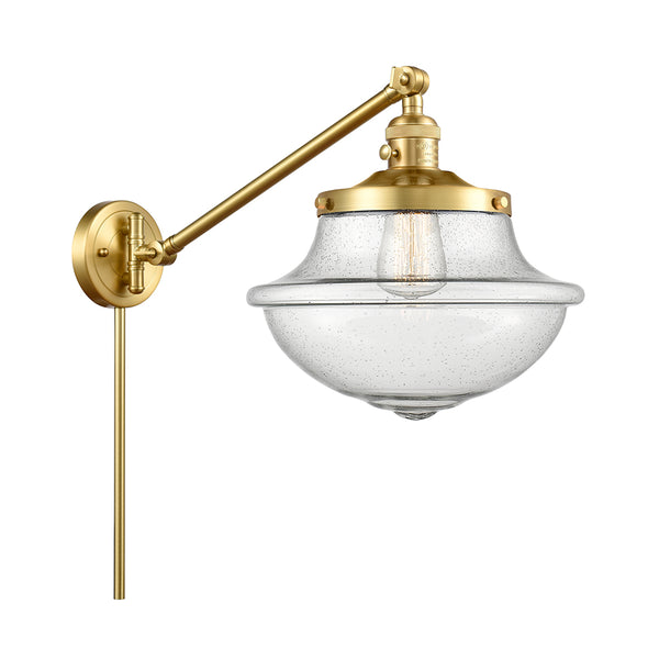 Oxford Swing Arm shown in the Satin Gold finish with a Seedy shade