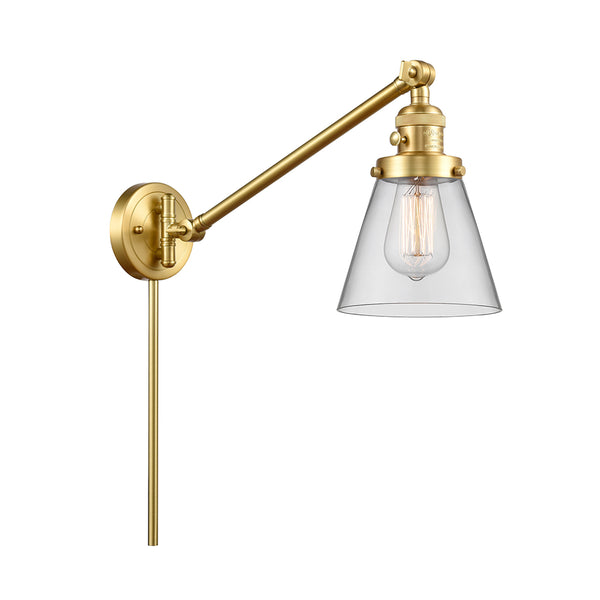 Cone Swing Arm shown in the Satin Gold finish with a Clear shade