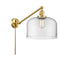 Bell Swing Arm shown in the Satin Gold finish with a Clear shade