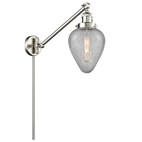 Geneseo Swing Arm shown in the Brushed Satin Nickel finish with a Clear Crackled shade