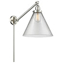 Cone Swing Arm shown in the Brushed Satin Nickel finish with a Clear shade