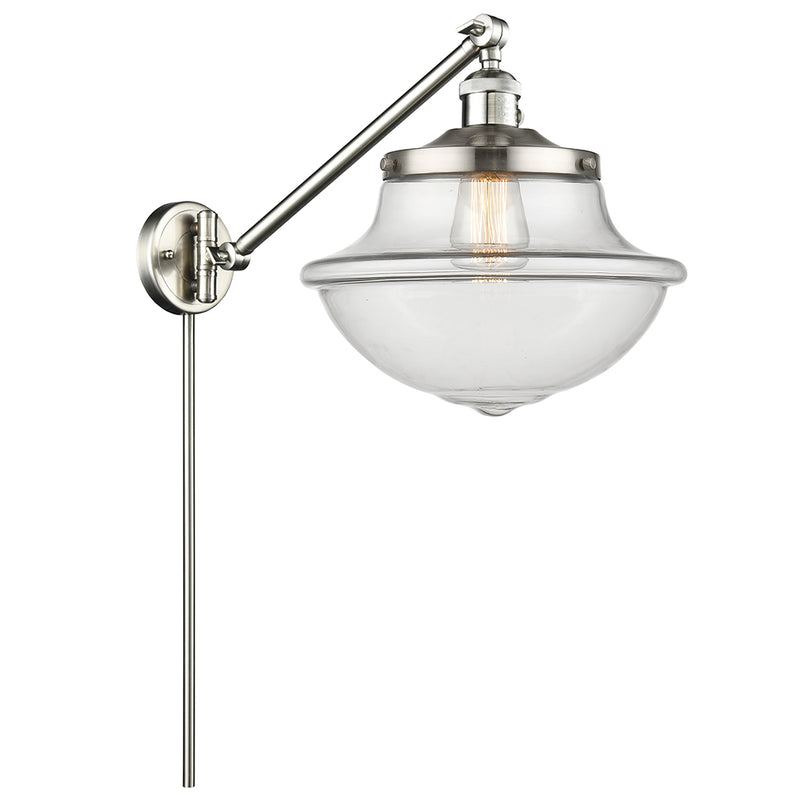 Oxford Swing Arm shown in the Brushed Satin Nickel finish with a Clear shade