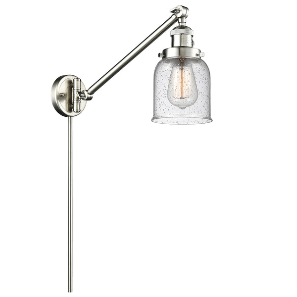 Bell Swing Arm shown in the Brushed Satin Nickel finish with a Seedy shade