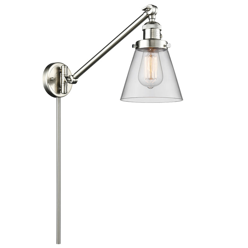 Cone Swing Arm shown in the Brushed Satin Nickel finish with a Clear shade