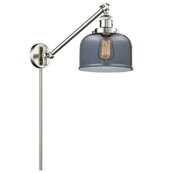 Bell Swing Arm shown in the Brushed Satin Nickel finish with a Plated Smoke shade