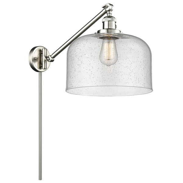 Bell Swing Arm shown in the Brushed Satin Nickel finish with a Seedy shade