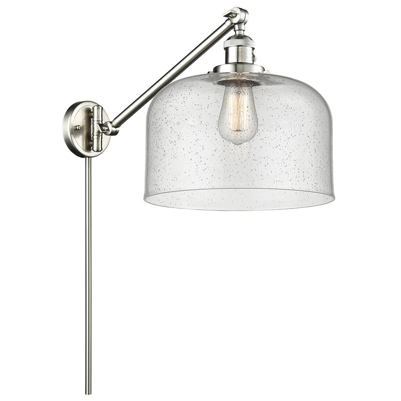 Bell Swing Arm shown in the Brushed Satin Nickel finish with a Seedy shade