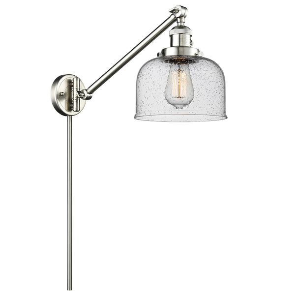 Bell Swing Arm shown in the Brushed Satin Nickel finish with a Seedy shade