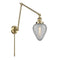Geneseo Swing Arm shown in the Antique Brass finish with a Clear Crackled shade