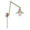 Halophane Swing Arm shown in the Antique Brass finish with a Clear Halophane shade
