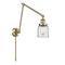 Bell Swing Arm shown in the Antique Brass finish with a Clear shade