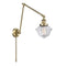 Oxford Swing Arm shown in the Antique Brass finish with a Clear shade