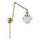 Oxford Swing Arm shown in the Antique Brass finish with a Seedy shade