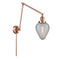 Geneseo Swing Arm shown in the Antique Copper finish with a Clear Crackled shade