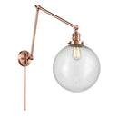 Beacon Swing Arm shown in the Antique Copper finish with a Seedy shade