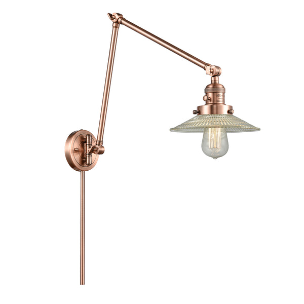 Halophane Swing Arm shown in the Antique Copper finish with a Clear Halophane shade