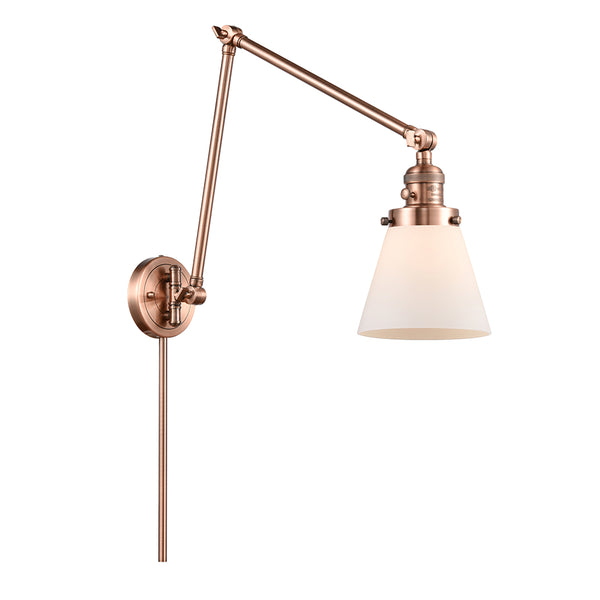 Cone Swing Arm shown in the Antique Copper finish with a Matte White shade