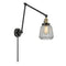 Chatham Swing Arm shown in the Black Antique Brass finish with a Clear shade
