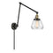 Fulton Swing Arm shown in the Black Antique Brass finish with a Clear shade