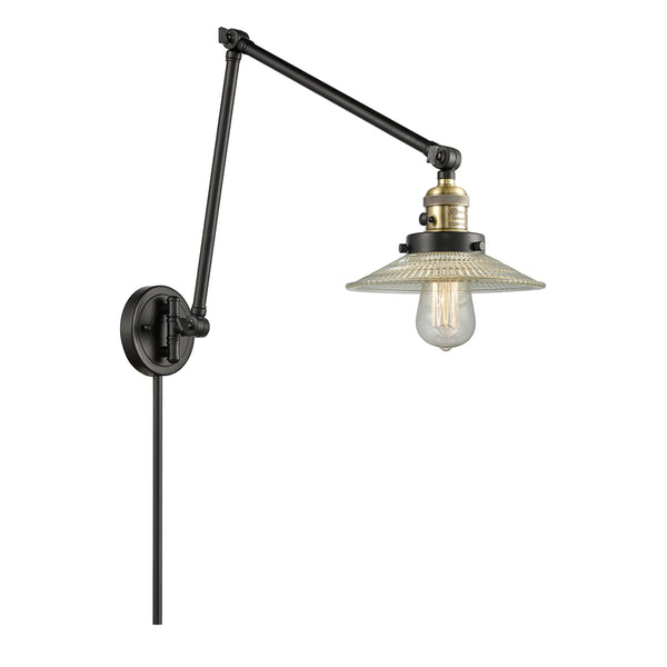 Halophane Swing Arm shown in the Black Antique Brass finish with a Clear Halophane shade