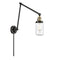 Dover Swing Arm shown in the Black Antique Brass finish with a Clear shade