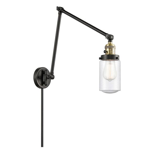 Dover Swing Arm shown in the Black Antique Brass finish with a Seedy shade