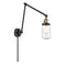 Dover Swing Arm shown in the Black Antique Brass finish with a Seedy shade