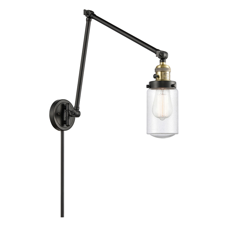 Dover Swing Arm shown in the Black Antique Brass finish with a Seedy shade